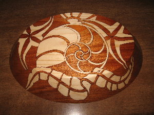 Seashells and Nautilus, decorative wooden bowls, bottom view of bowl